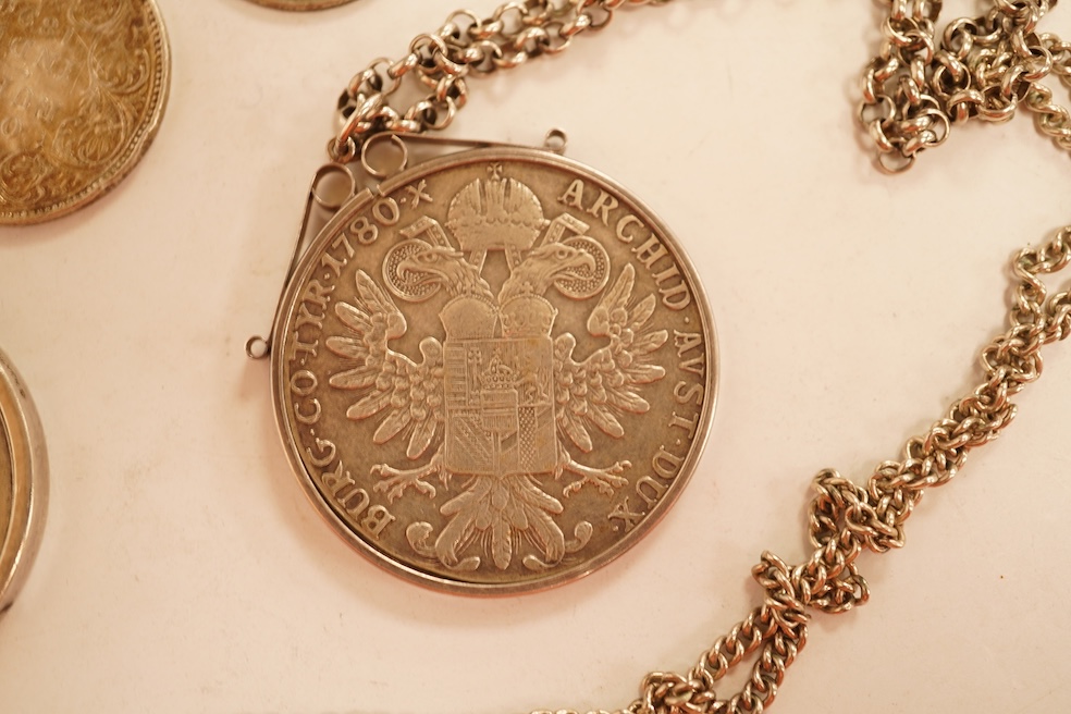 World coins, Victoria, 1891 crown, mounted with chain, Austria, Maria Theresa Thaler, mounted, CCCP medal award, a pierced one rupee India eighteen ninety and a novelty yes no fantasy coin.